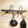 Double holders for sports equipment