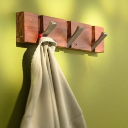 Wooden hangers with three hinged hooks