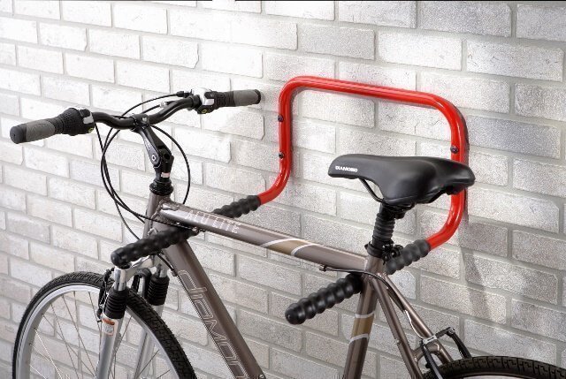 Wall-mounted holder for two bicycles