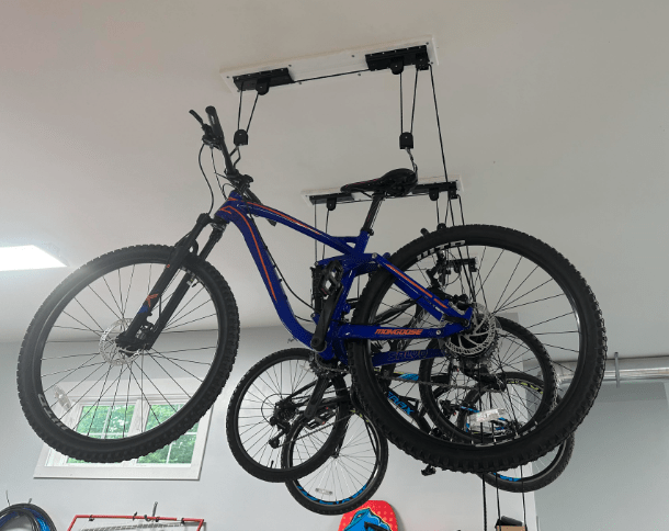Mottez holder for hanging a bicycle on the deck