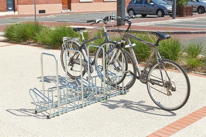 Double-sided bicycle racks with brackets