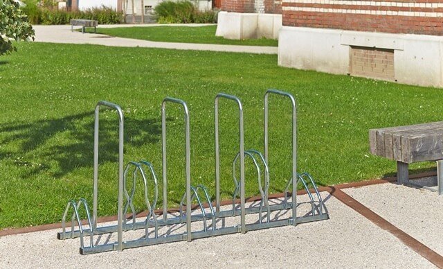 Racks with hoops for fixing bicycles