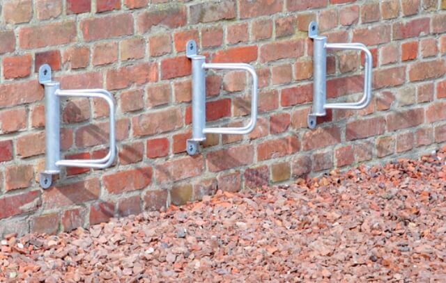 Corner, wall-mounted bike racks
