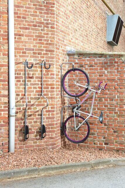 Wall mounts for locking bicycles