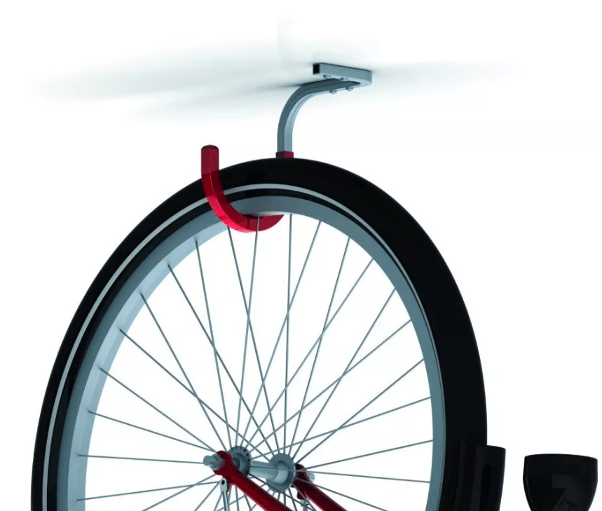 Seinale on kinnitatud ALFER (Saksamaa) alumiiniumklamber jalgratta riputamiseks
