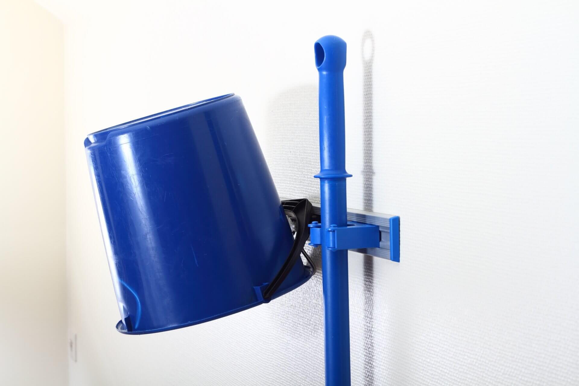 Holder for an inverted bucket
