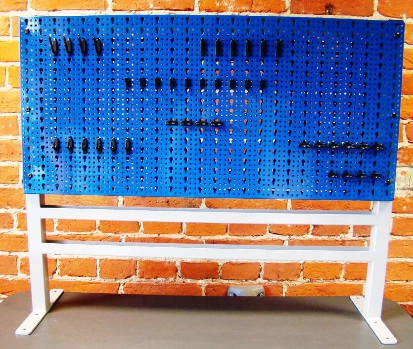 The perforated wall is attached to a special double-sided frame