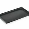 Aluminum baking trays covered with a non-stick coating