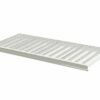 Shelf with white perforated plastic covers