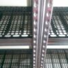 Racks with perforated plastic shelves