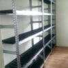 Racks with perforated plastic shelves