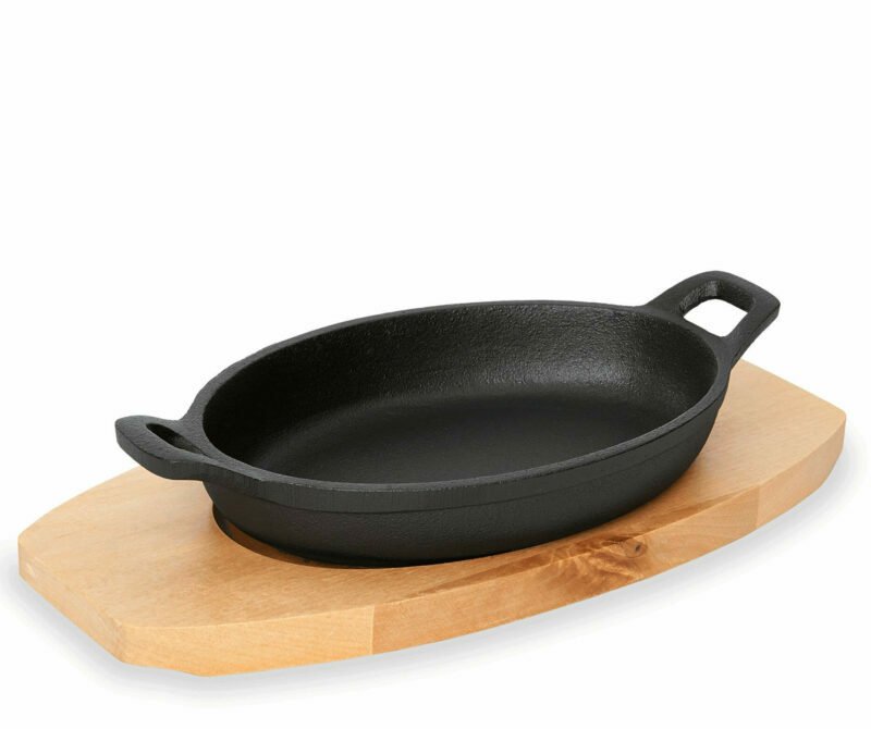 Oval cast iron pans for serving with wooden tables