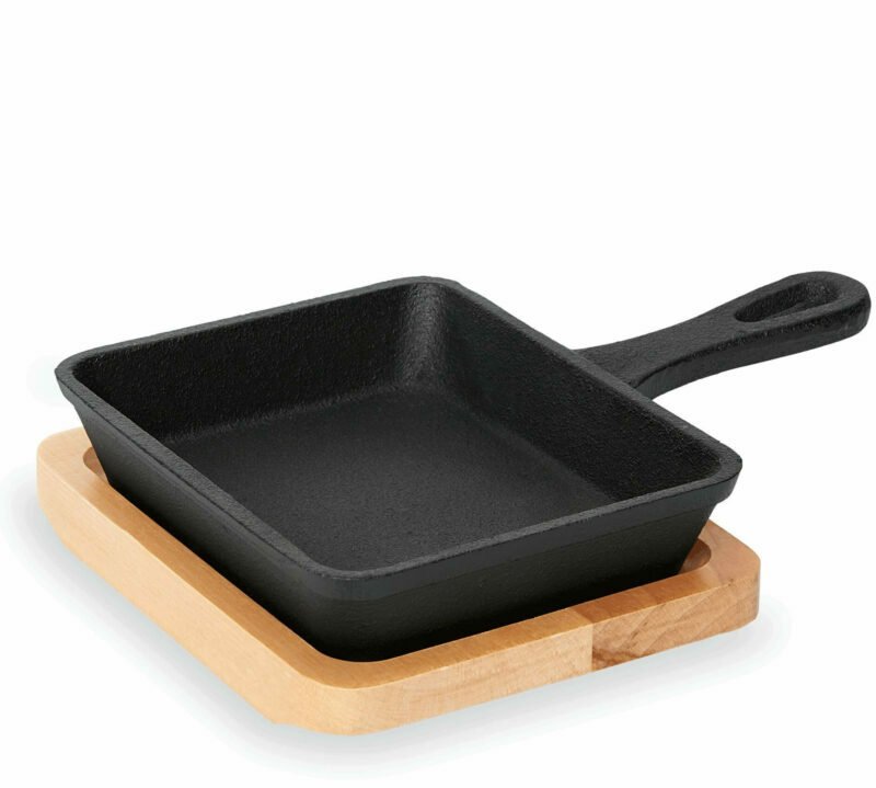 Cast iron pans with wooden table 3538140